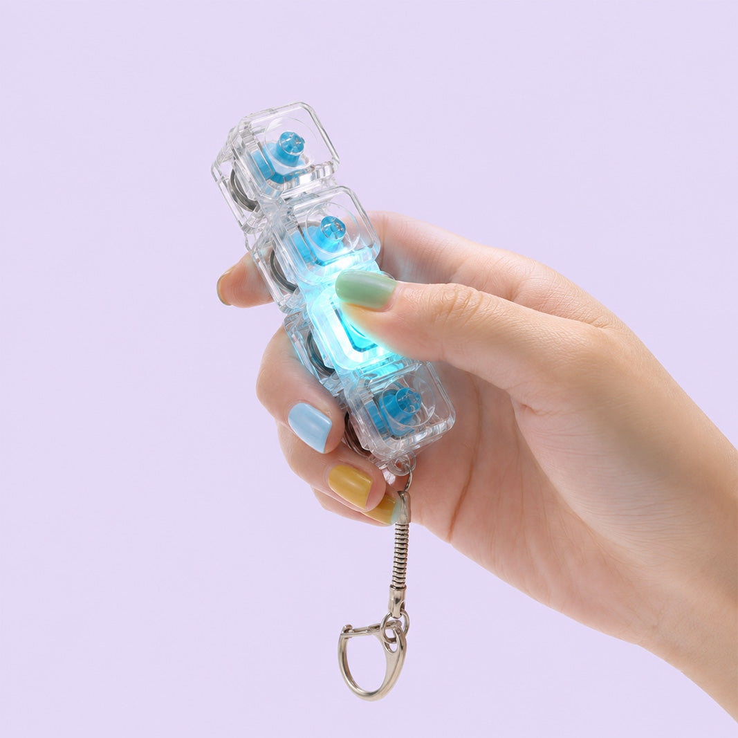 Clicket, a light-up button decompression toy