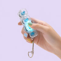 Clicket, a light-up button decompression toy