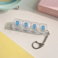 Clicket, a light-up button decompression toy
